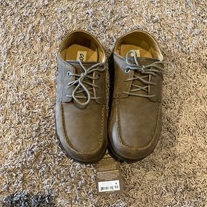 Brand new Olukai men’s slip on shoes